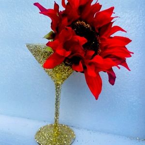 Gold martini glass with red flower